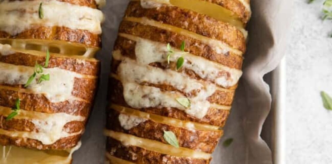 Deliciously crispy and cheesy hasselback potatoes cooked in the air fryer.