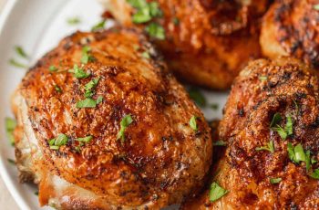 Air Fryer Chicken Thighs In the quest for the perfect chicken dish, one culinary method has been taking the world by storm - air frying. The process of air frying provides a delightful twist on classic recipes, promising a crispy and succulent outcome while significantly reducing the fat content. One particular delicacy that has gained immense popularity is the 'Air Fryer Chicken Thighs.' In this comprehensive guide, we will delve into the secrets and techniques to prepare this delectable dish that has captured the hearts and palates of many. The Crispy Marvel: Air Fryer Chicken Thighs Recipe Ingredients To create the perfect Air Fryer Chicken Thighs, you'll need the following ingredients: 4 bone-in, skin-on chicken thighs 1 tablespoon olive oil 1 teaspoon salt 1/2 teaspoon black pepper 1/2 teaspoon garlic powder 1/2 teaspoon onion powder 1/2 teaspoon paprika Instructions Preheat Your Air Fryer: Begin by preheating your air fryer to 380°F. This ensures a consistent and even cooking process. Prepare the Chicken Thighs: While the air fryer is heating up, gently pat the chicken thighs dry with a paper towel. This step helps in achieving that crispy skin we all crave. Season the Chicken: In a small bowl, mix the olive oil, salt, pepper, garlic powder, onion powder, and paprika. Coat the chicken thighs evenly with this flavorful mixture. This step is crucial in infusing the chicken with mouthwatering taste. Air Fry with Precision: Place the seasoned chicken thighs in the air fryer basket, skin side down. Cook for 12 minutes at 380°F. Flip and Continue Cooking: After the initial 12 minutes, flip the chicken thighs to ensure even cooking and crispiness. Cook for an additional 12 minutes at the same temperature. Check for Perfection: Once the timer goes off, make sure your chicken thighs have reached an internal temperature of 165°F. If needed, cook for a few more minutes. Serve and Enjoy: Remove your air-fried chicken thighs, let them rest for a few minutes, and then serve. The result should be tender, juicy, and irresistibly crispy skin. The Magic of Air Frying Why Air Frying? Air frying has taken the culinary world by storm for several reasons. It's not just about the crispy, golden-brown results. Air frying offers health benefits as well. Traditional frying methods involve submerging food in hot oil, leading to a calorie-laden dish. Air frying, on the other hand, uses hot air to circulate and cook food, resulting in the same crispy texture without the added fat and calories. It's a win-win situation for those who crave the satisfying crunch of fried food while staying conscious of their health. Advantages of Air Fryer Chicken Thighs 1. Healthier Eating Air frying reduces the amount of oil required for cooking, making it a healthier option compared to traditional frying methods. 2. Time-Efficient Air frying is faster than conventional oven cooking, making it an excellent choice for busy individuals. 3. Less Mess Say goodbye to the splatters and spills associated with deep frying. Air frying is a cleaner and less messy cooking method. 4. Versatile You can use your air fryer to cook a wide range of dishes, from chicken and fish to vegetables and even desserts. Variations and Seasonings One of the joys of air frying is the endless variety it offers. While our basic recipe is a delicious classic, you can experiment with various seasonings and flavors. Here are a few ideas to get you started: 1. Lemon and Herb Marinate your chicken thighs with lemon juice, thyme, and rosemary for a zesty and aromatic twist. 2. Spicy BBQ For those who enjoy a little heat, a mix of BBQ seasoning and chili powder will tantalize your taste buds. 3. Honey Mustard Drizzle a honey and mustard mixture over your chicken thighs before air frying for a sweet and tangy finish. The Final Word Air Fryer Chicken Thighs are a game-changer in the world of culinary delights. The crispy skin, succulent meat, and endless flavor possibilities make it a favorite among food enthusiasts. As you embark on your journey to create the perfect Air Fryer Chicken Thighs, remember the art lies in precision, flavor, and innovation. Whether you're a seasoned chef or a beginner in the kitchen, this dish is sure to impress. So why wait? Fire up your air fryer and dive into the world of culinary excellence. The next time you're craving a mouthwatering, crispy delight, you know exactly where to turn.